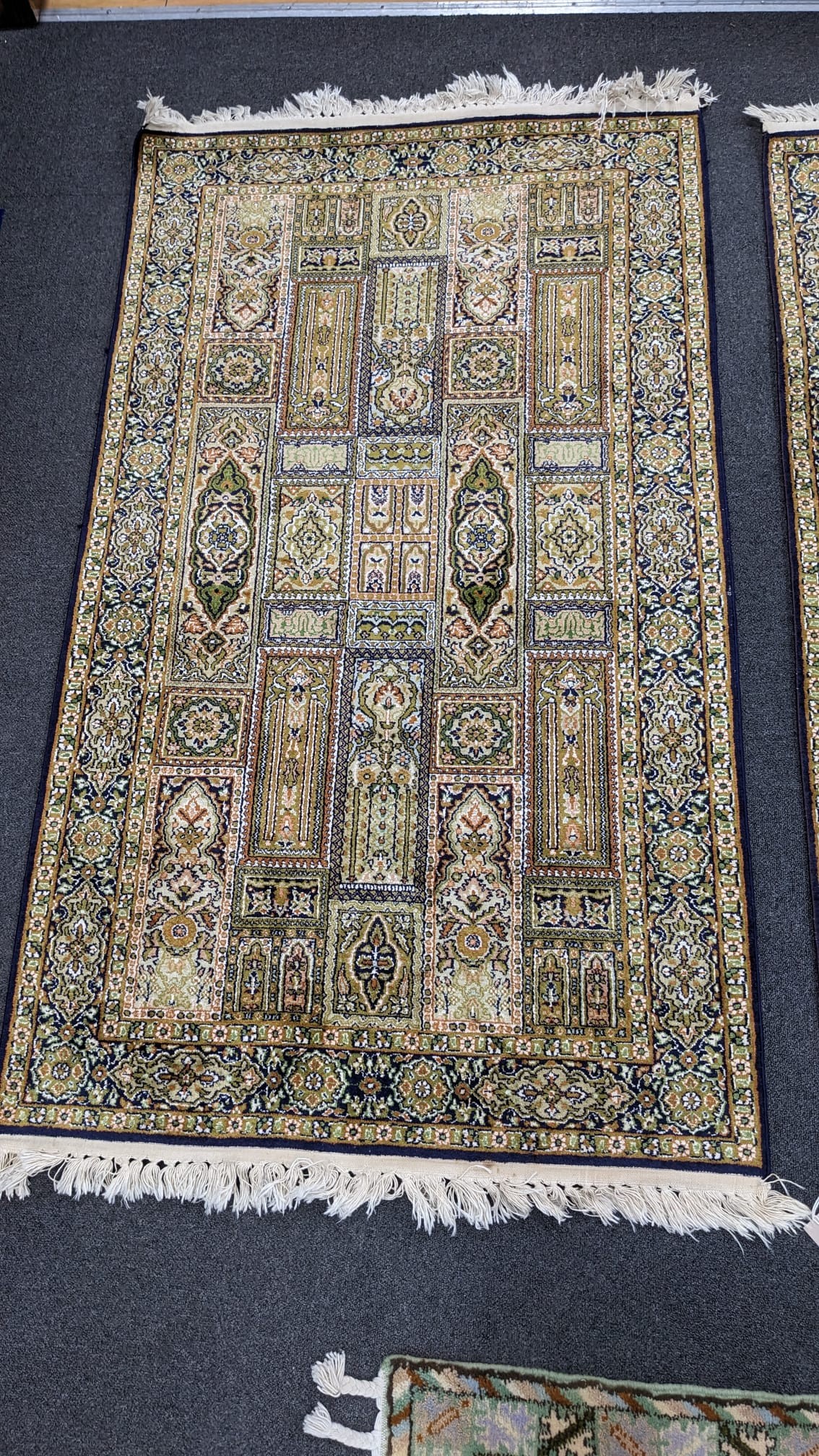 A near pair of North West Persian ivory ground part silk rugs, larger 154 x 95cm